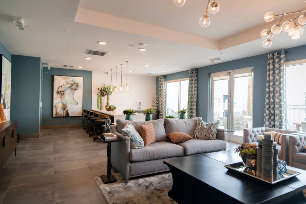 “Best living room design featuring contemporary seating, warm lighting, and premium finishes.”