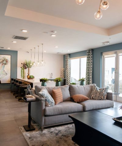 “Best living room design featuring contemporary seating, warm lighting, and premium finishes.”